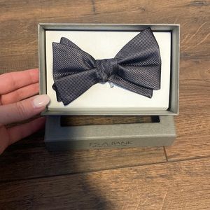 Brand new, never worn dark gray Jos. A. Bank bow tie in original packing